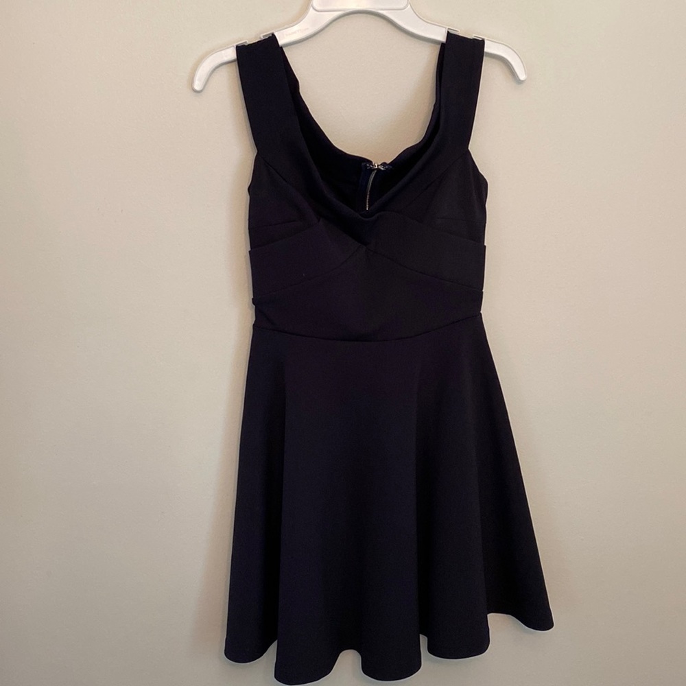 Navy junior dress size 10yr-12yr. Can be worn on or slightly off shoulder.